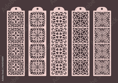 Set of five decorative laser cut bookmarks with intricate geometric patterns and a hole at the top for hanging, presented on a plain background vector