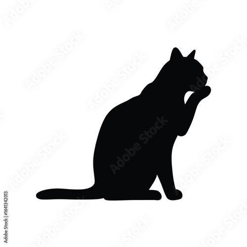 Black cat silhouette grooming its paw, isolated on white background, representing cleanliness and pet care
