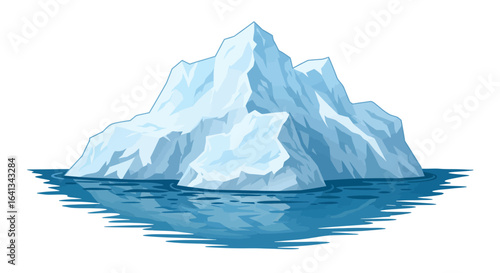 An iceberg with a jagged peak sits in blue water reflecting light