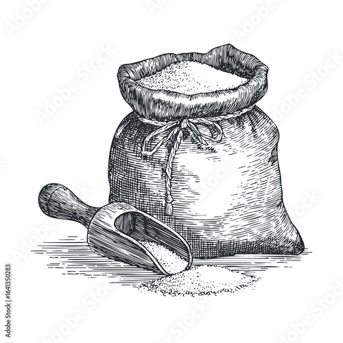Bag of granulated sugar with scoop on a wooden table