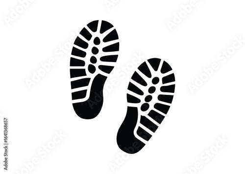 Pair of running shoe prints silhouette black vector white background