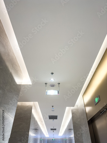 Sleek Elegance: Contemporary Hallway Ceiling with Modern Lighting Design