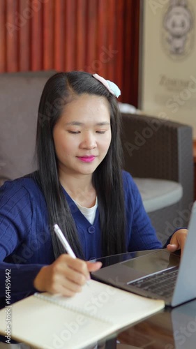 Young Asian woman working in an office