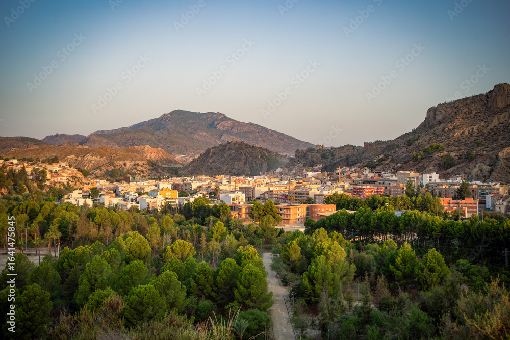 Fototapeta premium View of the Ricote Valley with the village of Blanca in the background, Murcia Region, Spain, at sunrise