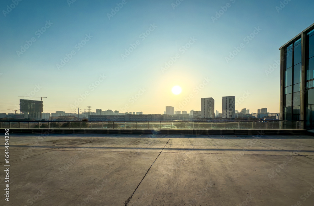 Fototapeta premium Serene Urban Sunset: Capturing Tranquility in Contemporary Cityscape