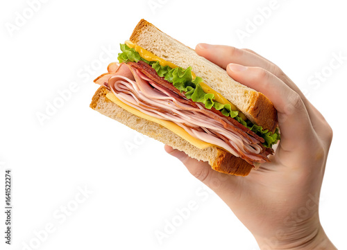 Hand holding a deli sandwich isolated on a white background, PNG image. -