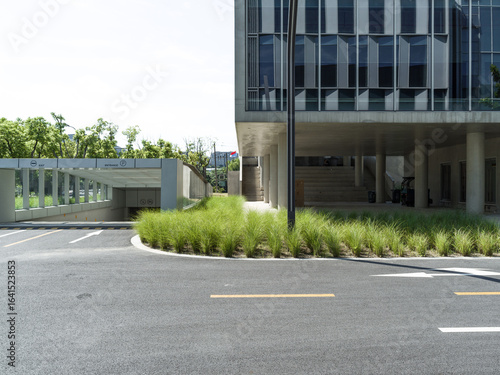 Wallpaper Mural enpty asphalt road with modern office building Torontodigital.ca