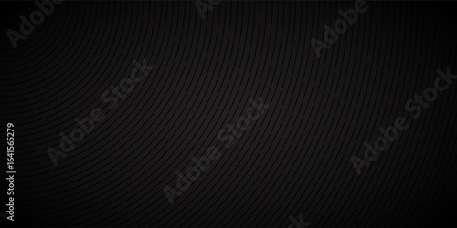 Modern black abstract background, the look of stainless steel, circular lines on a dark background