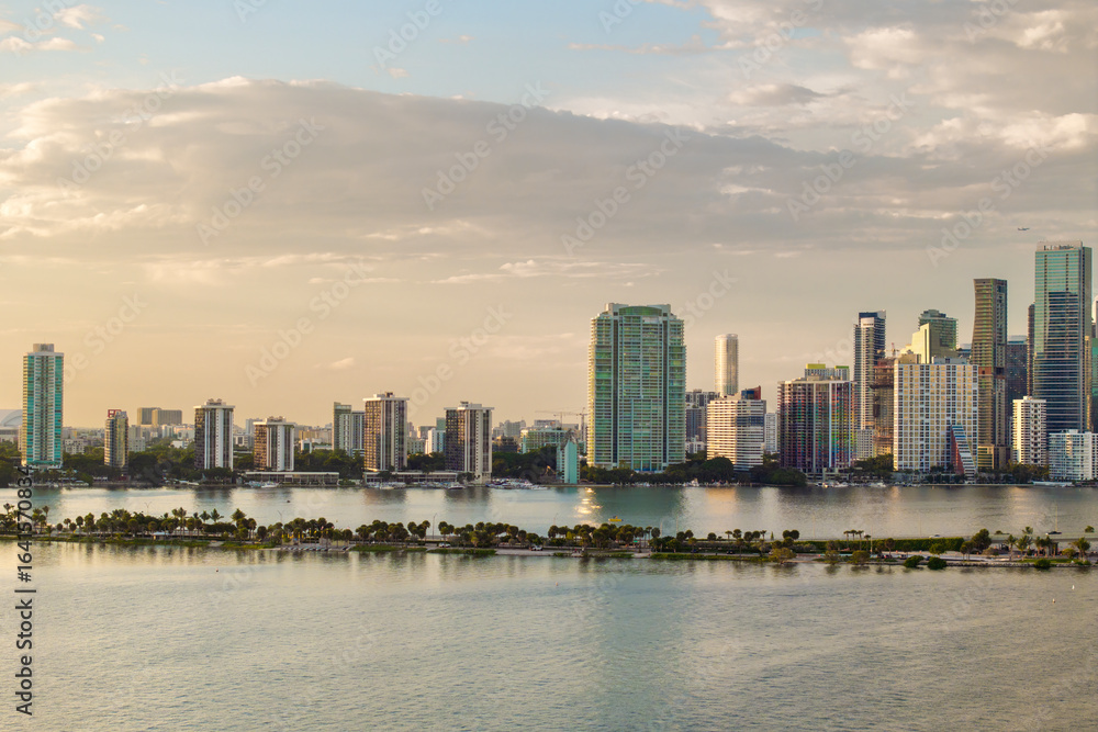 Fototapeta premium Downtown district of Miami Brickell in Florida, USA. Urban landscape of waterfront skyscraper buildings in modern American megapolis
