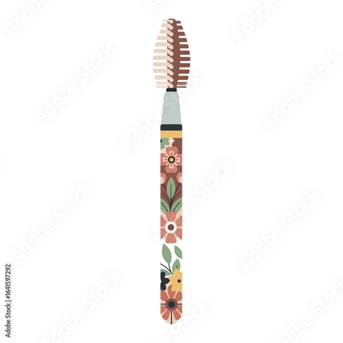 Makeup brush with floral design on handle and brown bristles at the top.