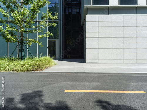 Wallpaper Mural enpty asphalt road with modern office building Torontodigital.ca