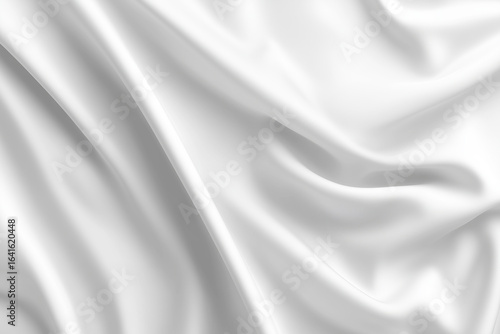 Close-up of a white silk or satin fabric with soft folds