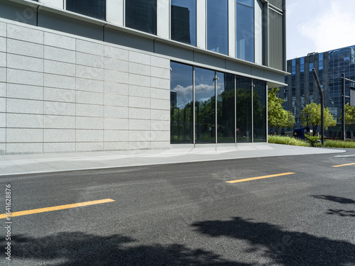 Wallpaper Mural enpty asphalt road with modern office building Torontodigital.ca