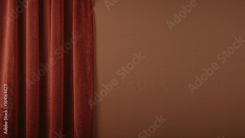 Scarlet curtains against a ...