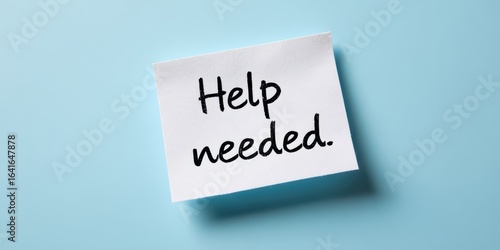 The help needed note on a blue background for clear communication.