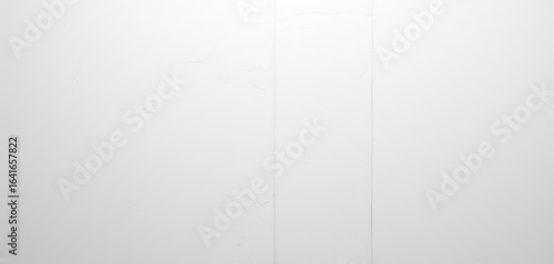 Smooth, subtly textured white concrete wall background, simple, bright