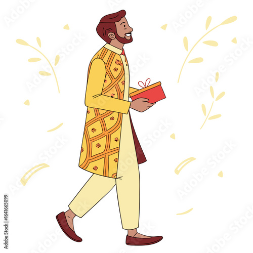 Smiling indian man in traditional yellow kurta holding a gift box while walking with decorative elements