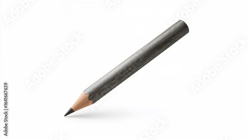 Lone pencil against a spotl...