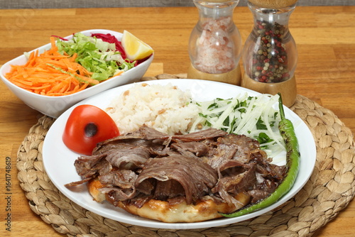 meat doner rice salad sumac onion roasted tomatoes pepper