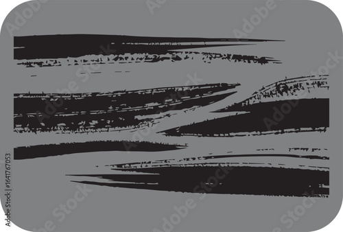 Abstract black brush strokes on a textured gray background evoking a sense of movement and artistic expression