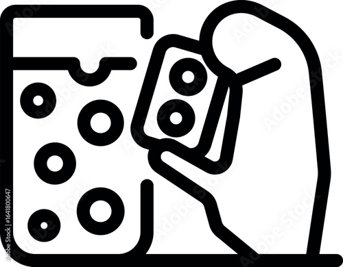 Hand holding medicine blister next to glass of water with effervescent tablets dissolving