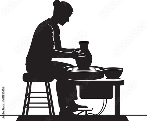 Silhouette of a potter shaping clay on a pottery wheel.
