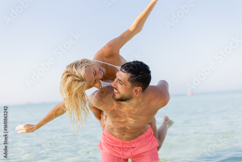 Joyful couple enjoying a pl...