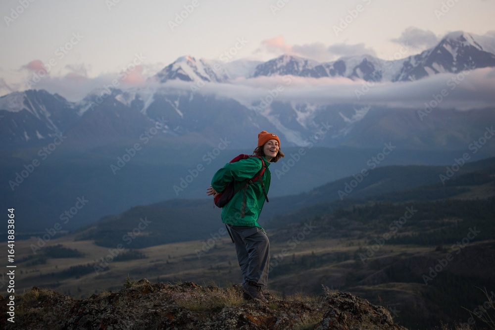 Fototapeta premium Travel and tourism. Girl in the mountains. Natural landscape