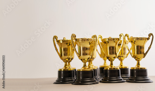 group of trophies in a row