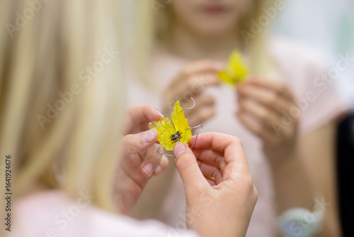 Orthodontic plastic plate in child's hands