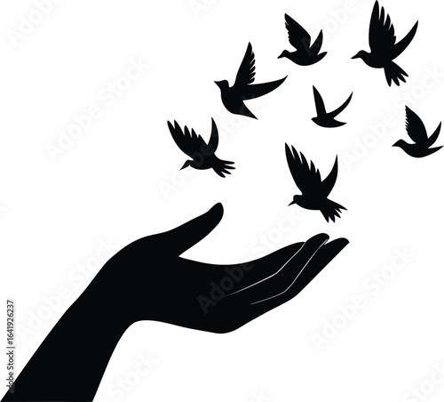 Silhouette of a hand releasing a flock of birds into the sky isolated on white background