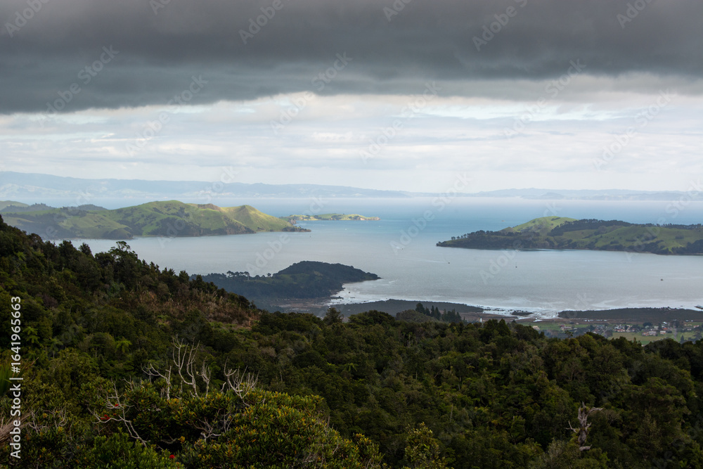 Scenic Coastal Landscape with Islands and Green Hills Scenic Coastal Landscape with Islands and Green Hills
