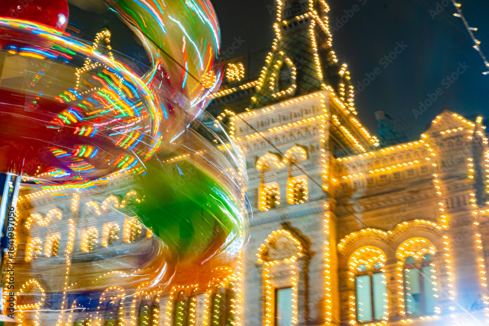 Spinning Carousel and Festive Building Lights Spinning Carousel and Festive Building Lights
