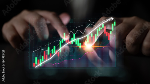 Konstfotografi Close-up view of hands manipulating digital financial graphs, showcasing stock market trends with ascending lines, emphasizing success and analytical insight