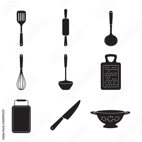 Collection of kitchen utensils and cooking tools isolated on white background