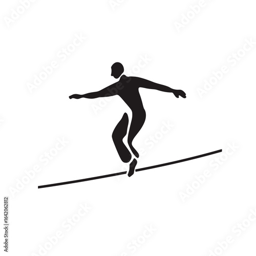 Silhouette of a man balancing delicately on a tightrope wire