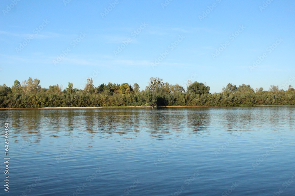 Obraz premium Water river lake landscape reflection of trees and bushes in water