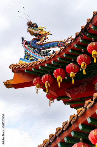 Chinese temple dragon on red roof