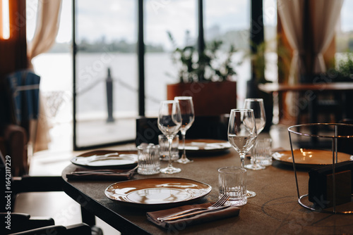 Elegant Restaurant Table Setting by Window