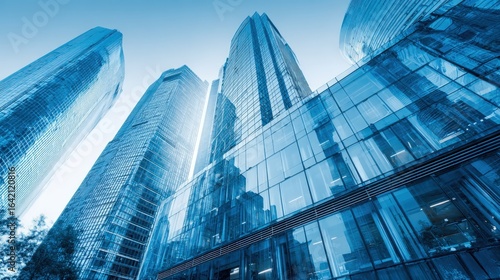 Wallpaper Mural Modern Cityscape Featuring Contemporary Glass Skyscrapers in a Bustling Financial District with Urban Blue Tones Torontodigital.ca