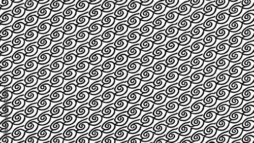 Abstract black and white swirl pattern with repeating decorative graphic elements
