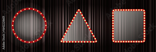 Brightly lit mirrors in three shapes are arranged against a dark curtain backdrop. The circular, triangular, and square designs share a vibrant red frame, creating a striking visual effect
