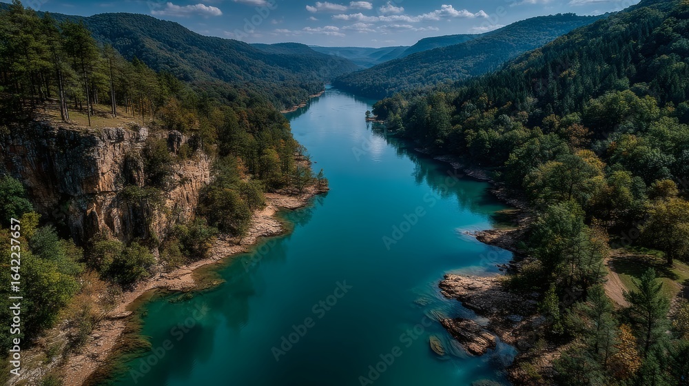 Fototapeta premium Aerial View of Serene Turquoise Lagoon, Cradled by Fine, Powdery Sands and a Pristine Azure Sky