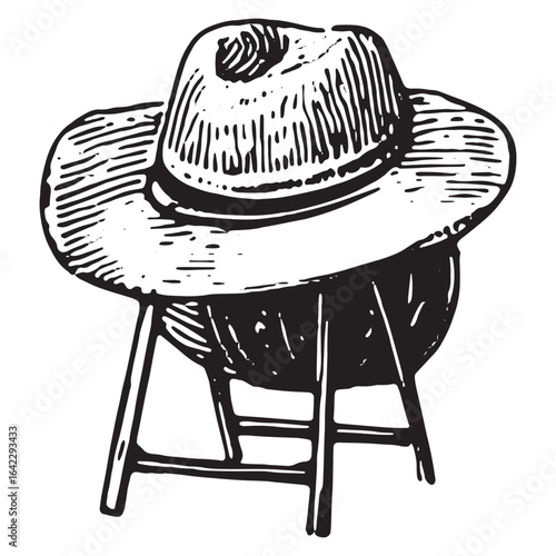 Vintage sketch of straw hat resting on wooden stool in rustic farm style