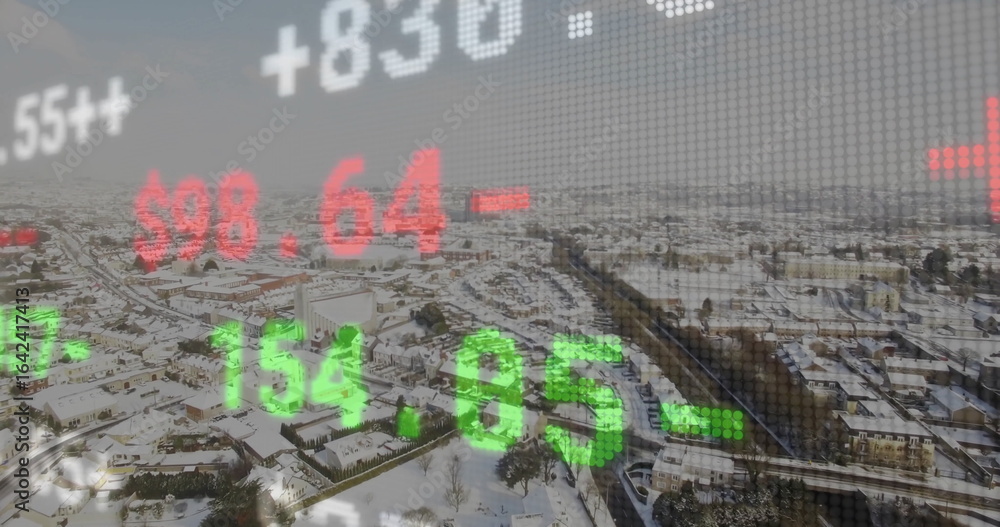 Naklejka premium Overlaying green and red stock ticker numbers over snow-covered suburban rooftops and bare trees