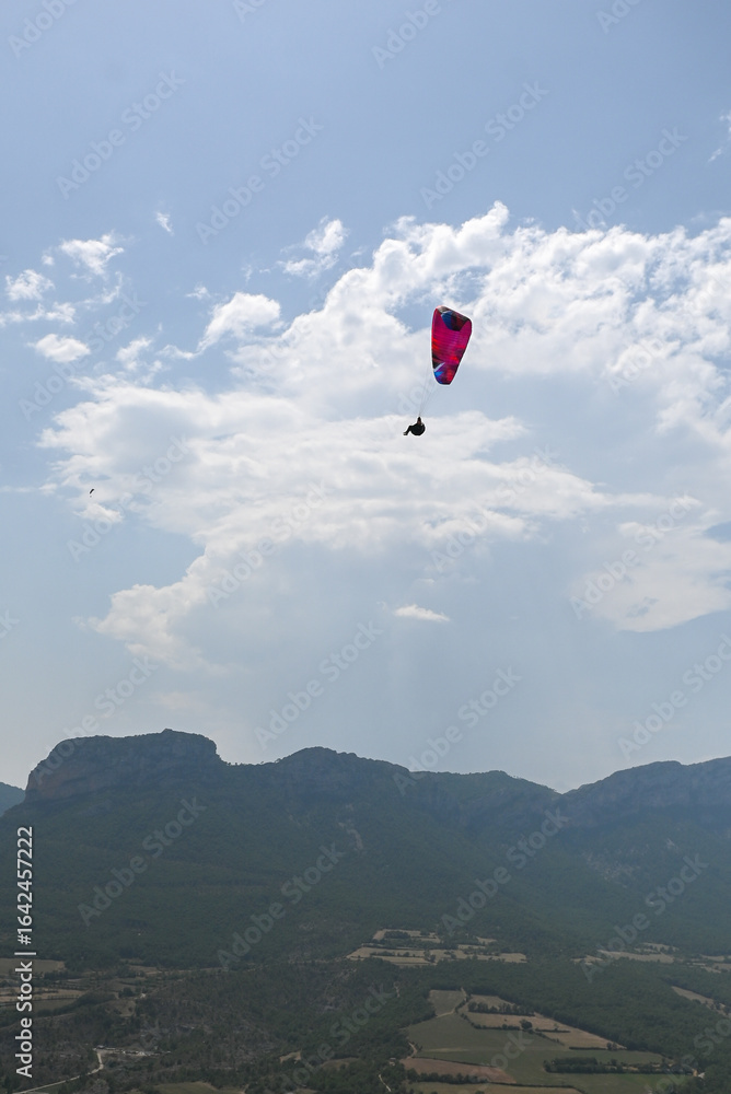 custom made wallpaper toronto digitalMan paragliding in the town of Organya in the province of Lleida in northern Spain in August 2025.