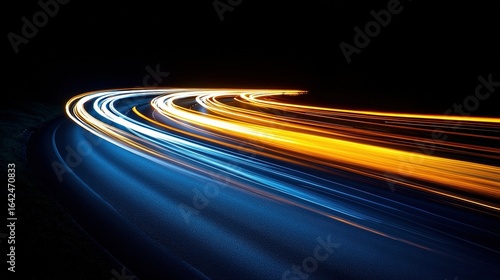 Light trails in motion against a dark background create an abstract pattern.