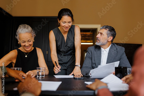 Lawyers working together on a case in office meeting room