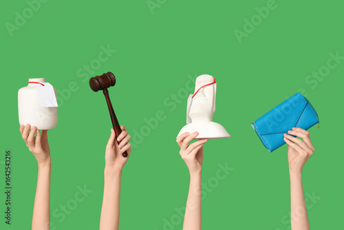 Female hands with auction g...