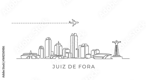 Juiz de Fora Skyline Plane flies above.